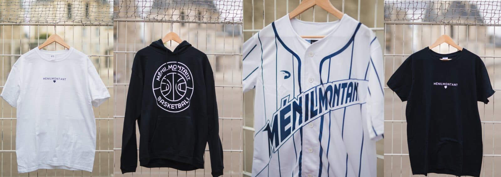 T-shirts, hoodie et maillot du club suspendus sur un grillage de playground